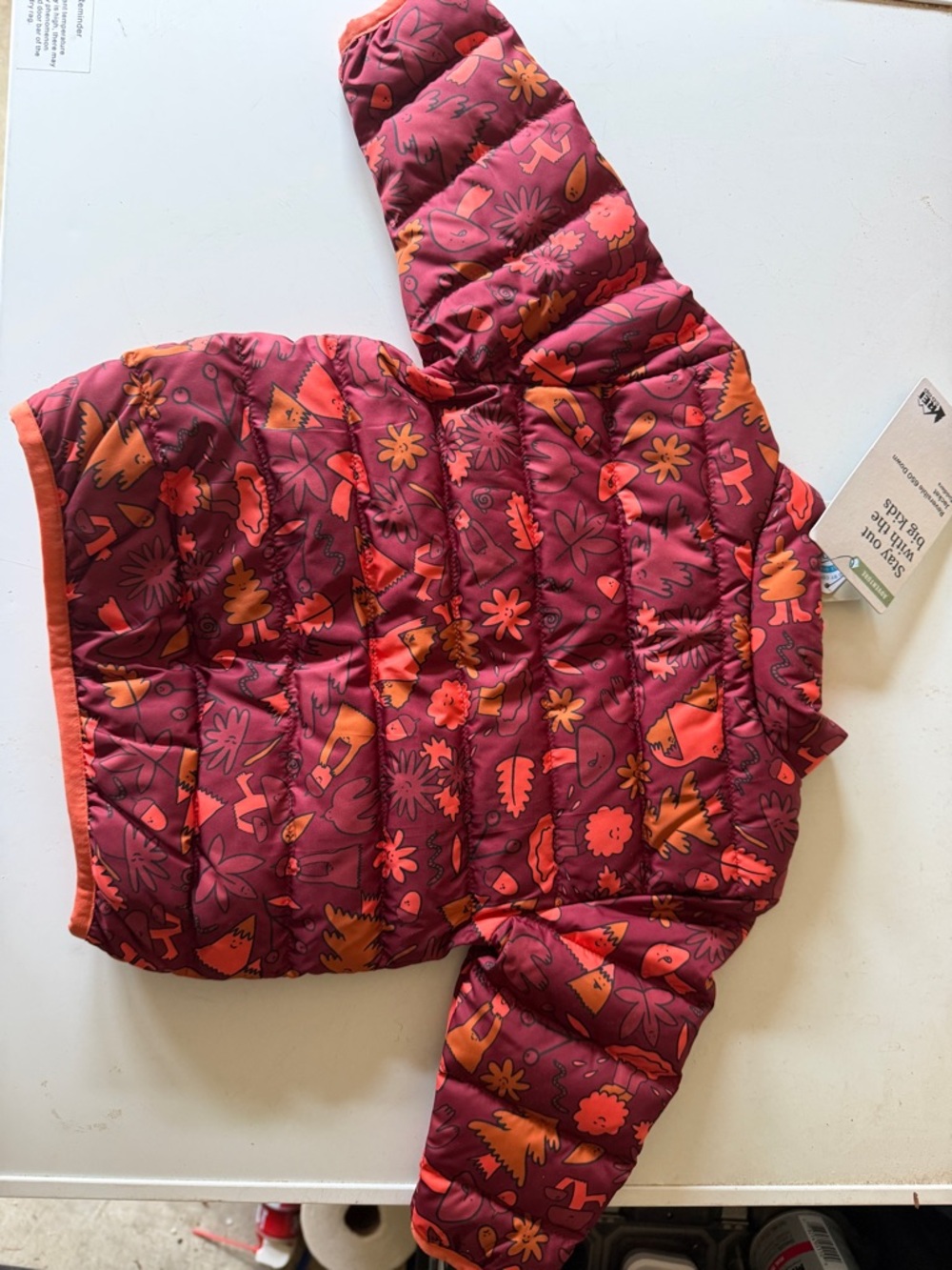 REI toddler reversible down jacket in coral and purple